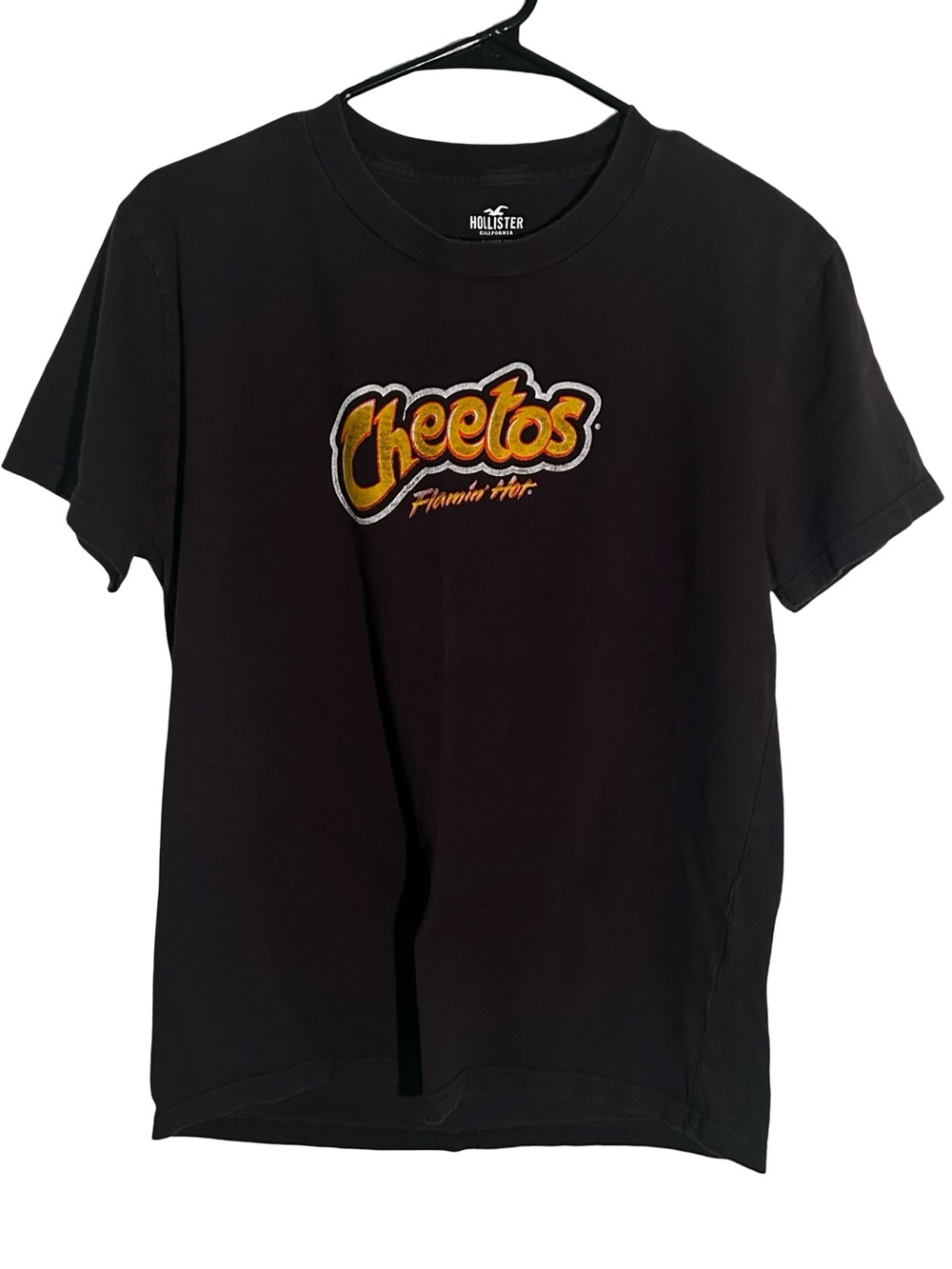 Hollister Black Tee with Orange & Yellow Cheetos Logo